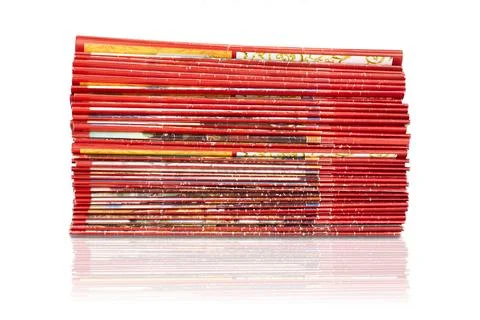 Stack of red magazines on white background isolated Stock Photos