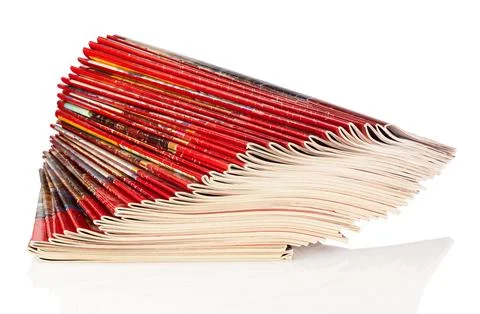Stack of red magazines on white background isolated Stock Photos