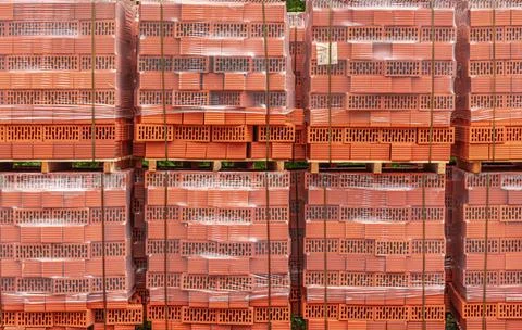 A stack of red sealed bricks. Stock Photos