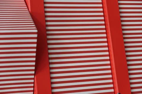 A stack of red with white stripes boxes Stock Photos