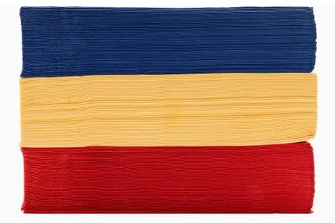 Stack of red yellow and blue napkin paper. Foto stock