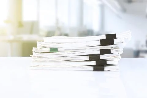 Stack of reporting paper documents on a business table in the office, busines Fotos de archivo