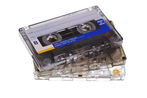 Stack of retro audio cassettes isolated on white background Foto stock