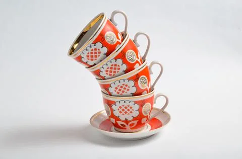 Stack of retro cups on a white background.. Stock Photos