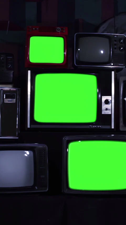 Stack of Retro Television Sets Turning Off with Green Screens, Vertical 4K Stock Footage 325622492