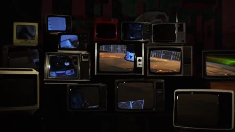 Stack of Retro TVs Displaying Planet Earth Timelapse from ISS  Stock Footage 118873571