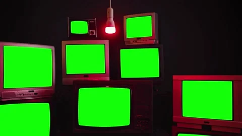 Stack of Retro Vintage TV Turning On Green Screens. Video stock 154584654