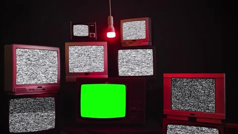 Stack of Retro Vintage TV Turning On Green Screens. Stock Footage 168361753