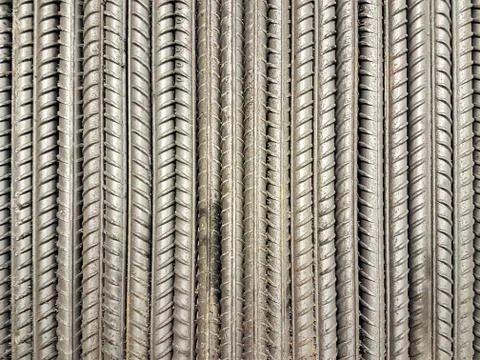 Stack of ribbed steel bars for construction. top view Stock Photos