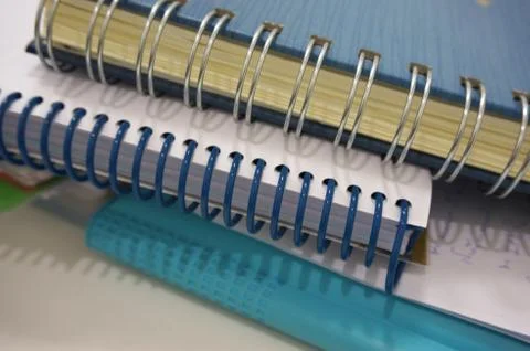 Stack of ring binder book on desk Stock Photos