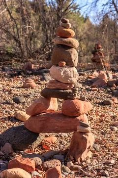 A stack of rocks is arranged in a pyramid shape Stock Photos