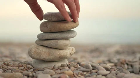 A stack of rocks on a beach Stock Footage 276480651
