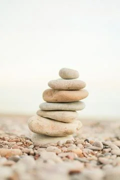 A stack of rocks on a beach Stock Photos