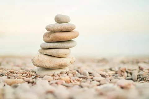 A stack of rocks on a beach Stock Photos