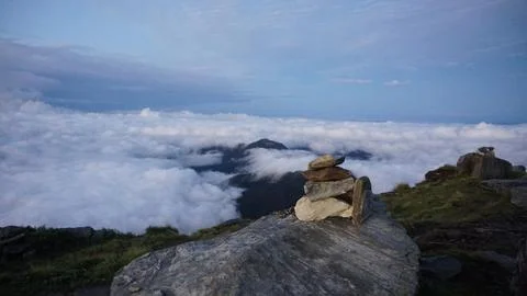 Stack of rocks on a large boulder in a mountainous area. Chandrashila, Uttarakha Foto stock