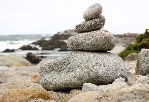 Stack of rocks by the ocean Stock Photos