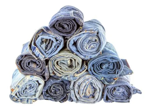 Stack of rolled jeans isolated on white background Stock Photos