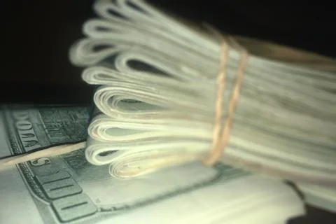 Stack of Rolled US Dollar Bills Stock Photos