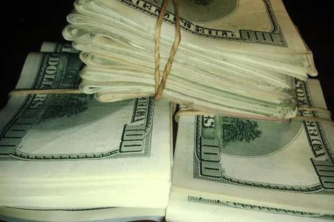 Stack of Rolled US Dollar Bills Stock Photos