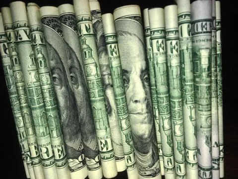 Stack of Rolled US Dollar Bills Stock Photos