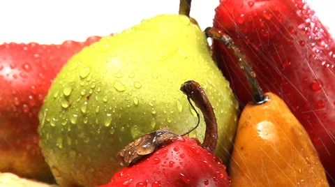Stack of rotating red, green and yellow pears Stock Footage 46585373