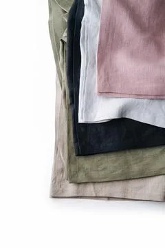 Stack of rough layered tableclothes placed one on another Foto stock