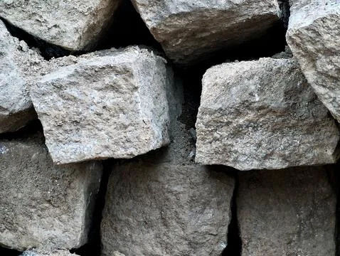 Stack of rough quarried limestone blocks Stock-Fotos