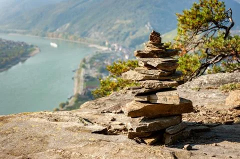 A stack of rough stones on a rocky surface Stock Photos