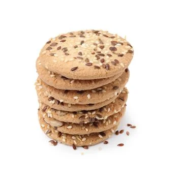 Stack of round cereal crackers with flax, sunflower and sesame seeds isolat.. Stockfoto's