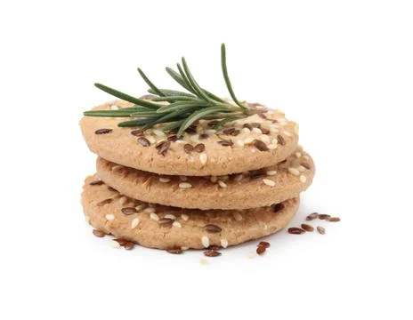 Stack of round cereal crackers with flax, sunflower, sesame seeds and rosem.. Stock-Fotos