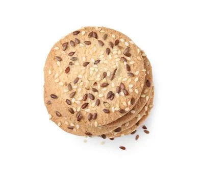 Stack of round cereal crackers with flax, sunflower and sesame seeds isolat.. Stock-Fotos