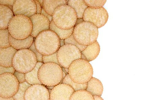 Stack of round cracker biscuits background Stock-Fotos