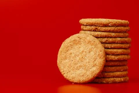 Stack of round oat cookies on paper background Stock-Fotos