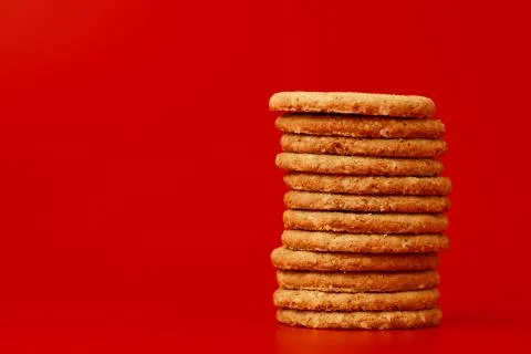Stack of round oat cookies on paper background Stock-Fotos