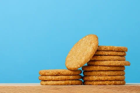Stack of round oat cookies on paper background Stockfoto's