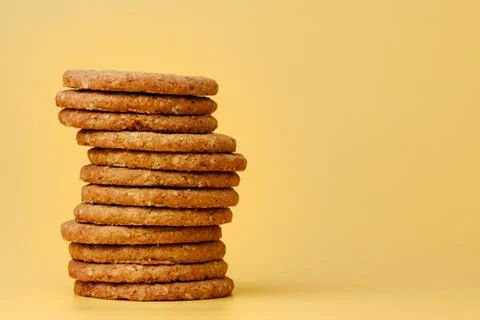 Stack of round oat cookies on paper background Stock-Fotos