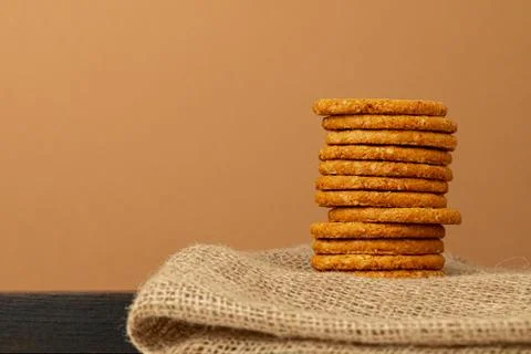 Stack of round oat cookies on paper background Foto stock