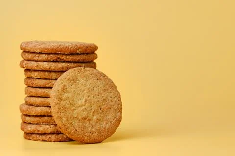 Stack of round oat cookies on paper background Stock-Fotos