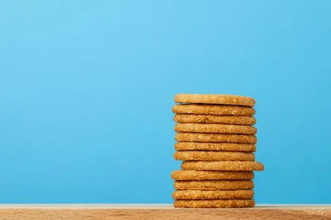 Stack of round oat cookies on paper background Stock-Fotos