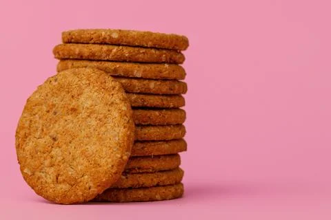 Stack of round oat cookies on paper background Stock-Fotos