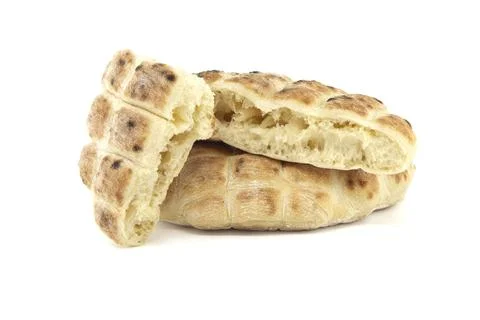 Stack of round pita flat-breads isolated on a white background, pita bread has a Fotos Stock