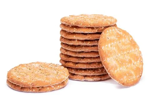 A Stack of Round Salt Crackers with Sesame Isolated on White Background Foto stock
