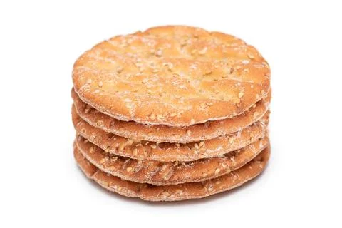 A Stack of Round Salt Crackers with Sesame Isolated on White Background Stock-Fotos