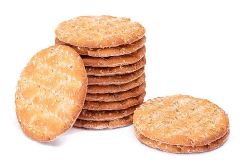 A Stack of Round Salt Crackers with Sesame Isolated on White Background Stock Photos