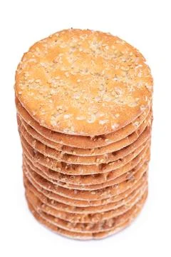 A Stack of Round Salt Crackers with Sesame Isolated on White Background Stock Photos