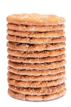 A Stack of Round Salt Crackers with Sesame Isolated on White Background Foto stock