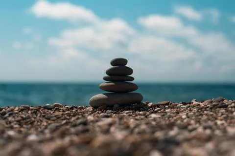 Stack of round smooth stones on a seashore Stock-Fotos