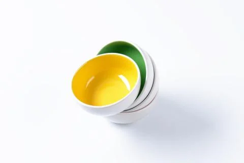 Stack of round two tone bowls Stockfoto's