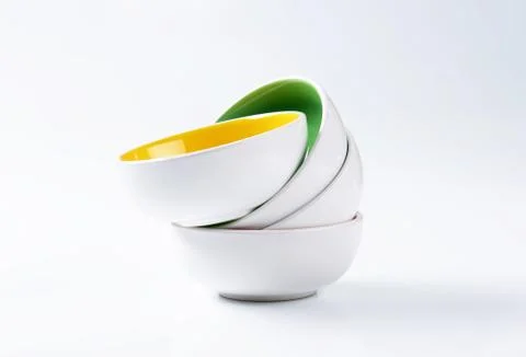 Stack of round two tone bowls Stockfoto's