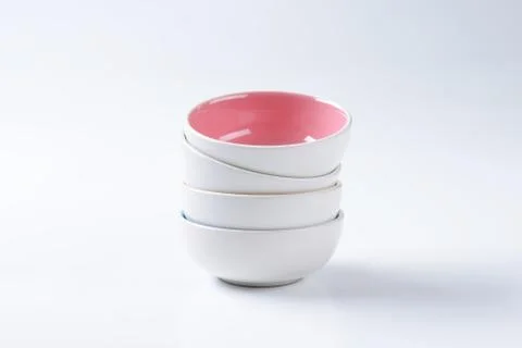 Stack of round two tone bowls Foto stock